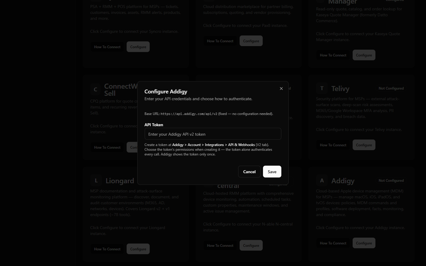 StackJack Connectors page with the Addigy Configure dialog open, showing the single API Token field and the fixed base URL note